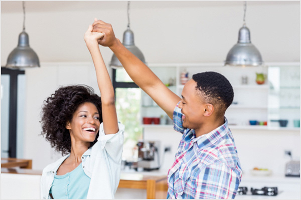 couple_in_new_home_conforming_productpage Couple dancing in new home