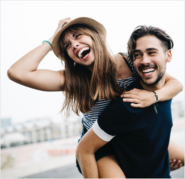 happycouple_FHA_productpage Happy couple, boyfriend giving girlfriend piggyback