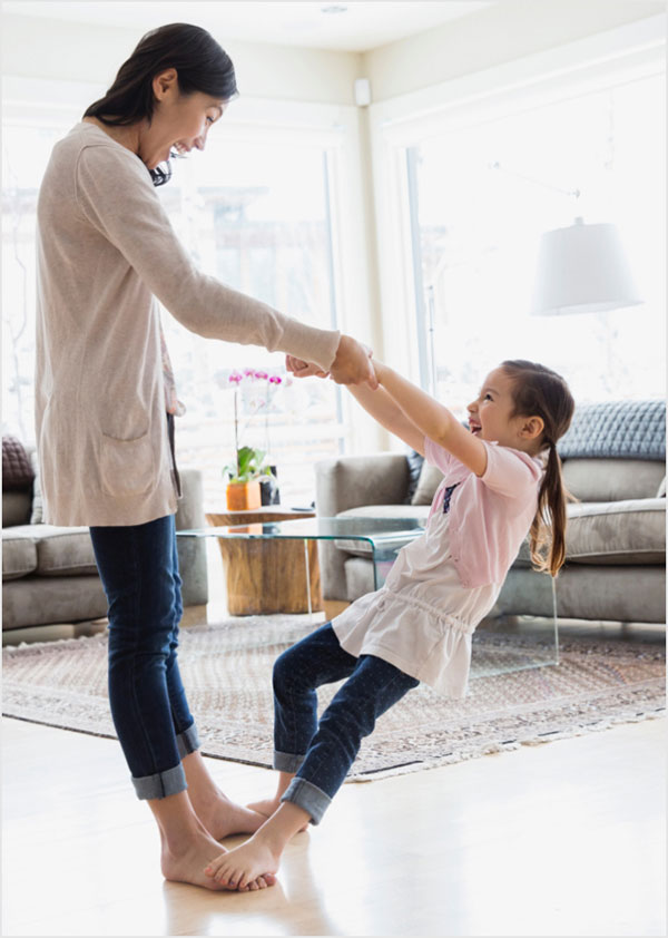 mother_and-daughter_FixedRate_productpage Mother and daughter dancing in living room