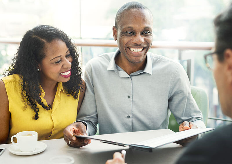 buying-home-little-no-payment-right Couple happy with advice from financial advisor