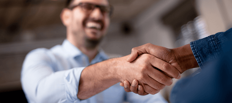 Handshake in professional setting