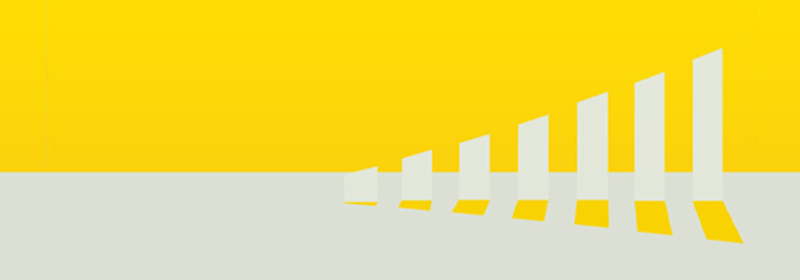 Bar graph cut out of white paper on yellow background