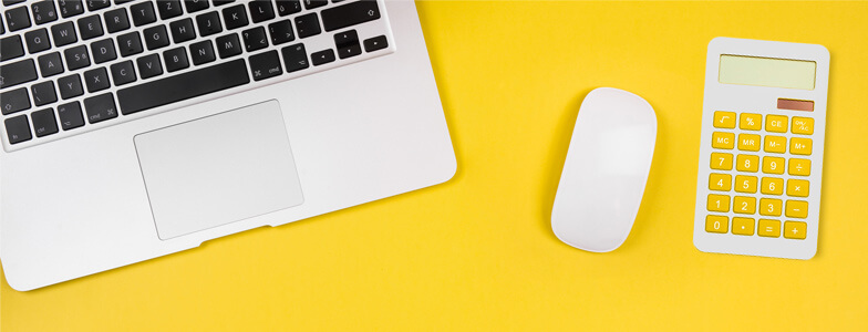 mortgage-help-programs-and-assistance Computer with Guild yellow background