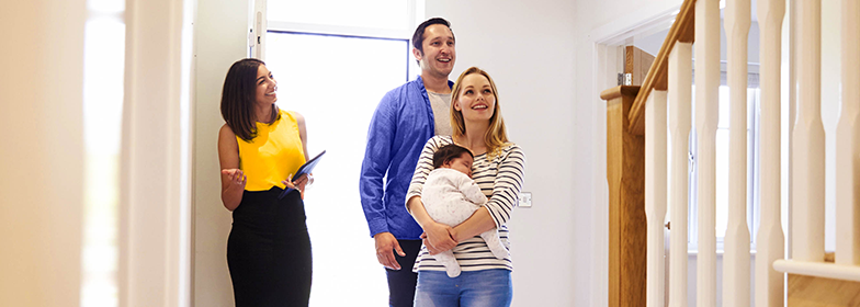 Blog 3 Young couple viewing home with realtor