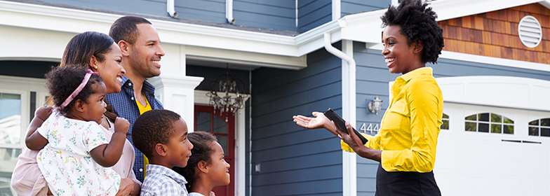 Agent showing family a home