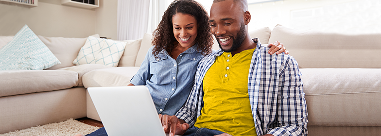 September Blog 3 A man and woman looking at a laptop