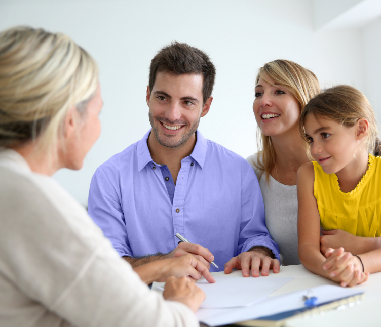 Family working with Loan Officer