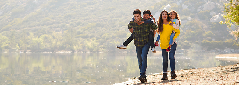 e1046627-7327-4b9b-b1d5-8d6e56204a6d A young family hiking