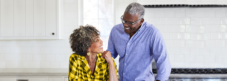 June 2023 Blog 2 An elderly couple smiling at each other