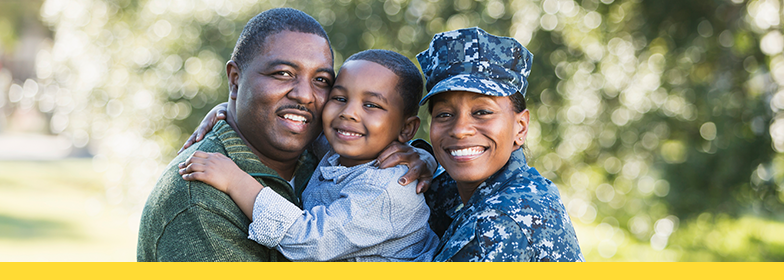 A military family smiling