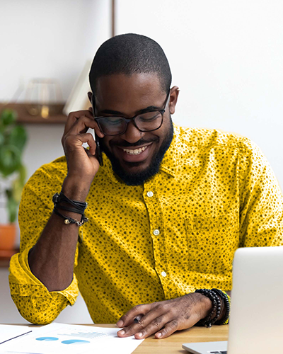 Smiling businessman on the phone