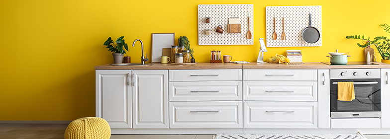 Bright yellow kitchen in home