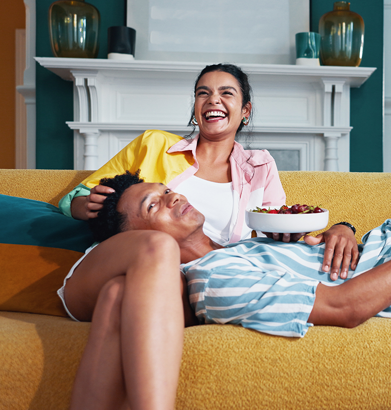 MyPath2Own_Mobile-hero Couple laughing on couch