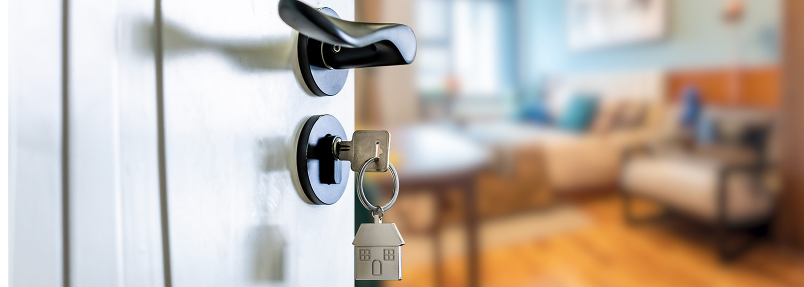 Key in door to new home